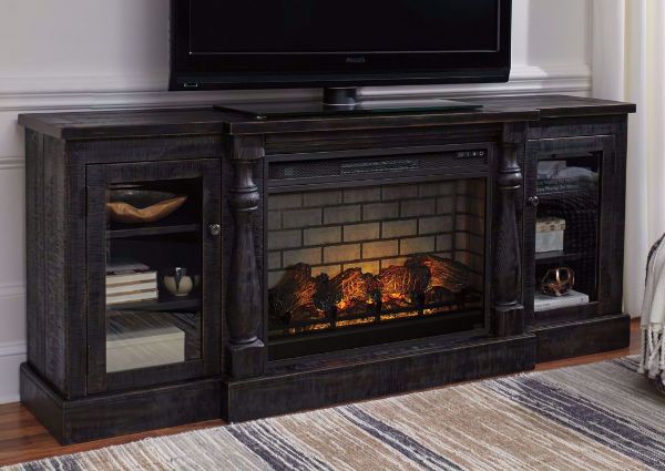 Black Mallacar TV Stand with Fireplace by Ashey Furniture in a Room Setting | Home Furniture Plus Mattress