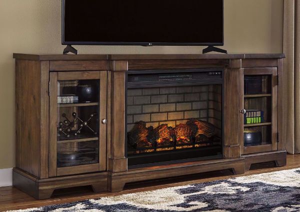 Brown Flynnter TV Stand & Fireplace by Ashley Furniture in a Room Setting | Home Furniture Plus Mattress