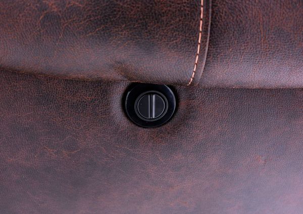 Power Activation Button on the Austin Power Reclining Sectional Sofa with Dark Brown Microfiber Upholstery | Home Furniture + Mattress