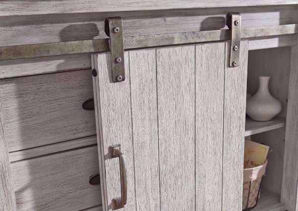 Barn Door Accent with View of Enclosed Cabinet on the Rustic White Brashland Chest of Drawers by Ashley Furniture | Home Furniture Plus Bedding