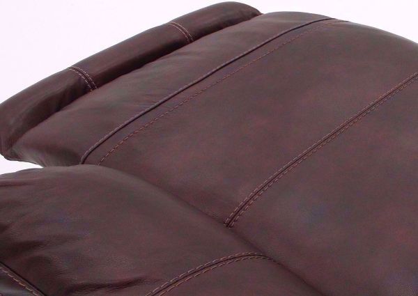 Close Up of Dark Brown Leather and Accent Stitching on the Catanzaro Power Activated Reclining Sofa by Ashley Furniture | Home Furniture + Mattress
