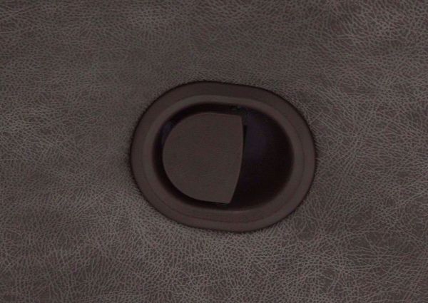 Close Up Detail of the Reclining Button on the Denali Reclining Sofa by HomeStretch | Home Furniture Plus Bedding