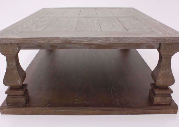 Side End View of  the Johnelle Coffee Table by Ashley Furniture with a Weathered Gray and Brown Finish | Home Furniture Plus Mattress