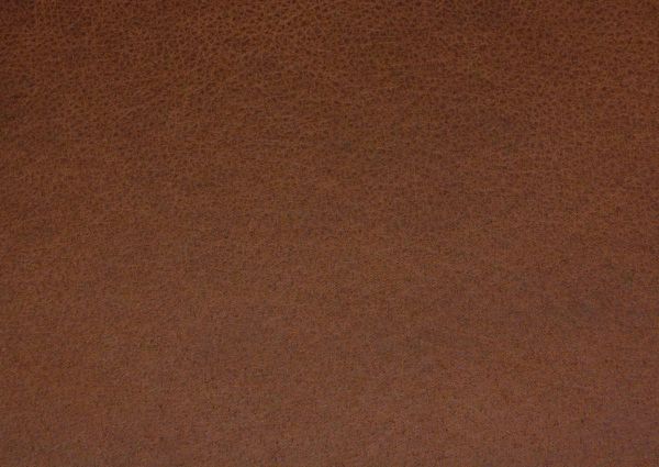 Close Up of Saddle Brown Upholstery on the McGann Rocker Recliner by Ashley Furniture | Home Furniture Plus Bedding