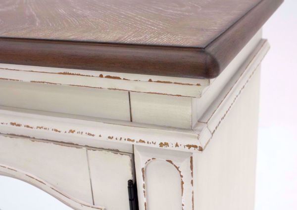 Top Corner Details of the Distressed White Realyn TV Stand by Ashley Furniture | Home Furniture Plus Bedding