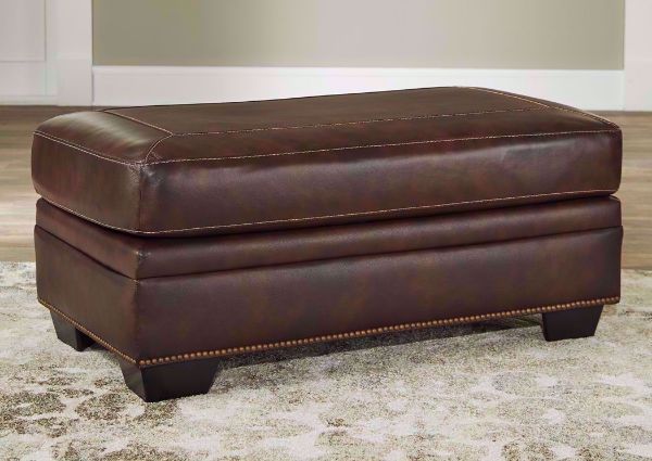 Walnut Brown Roleson Ottoman by Ashley in a Room Setting | Home Furniture Plus Bedding