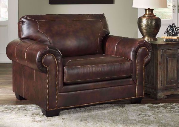 Walnut Brown Roleson Chair by Ashley in a Room Setting | Home Furniture Plus Bedding