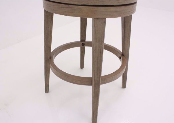 Gray and Beige Chesney Swivel Barstool 30 Inch at an Angle Showing the Wood Legs | Home Furniture Plus Mattress