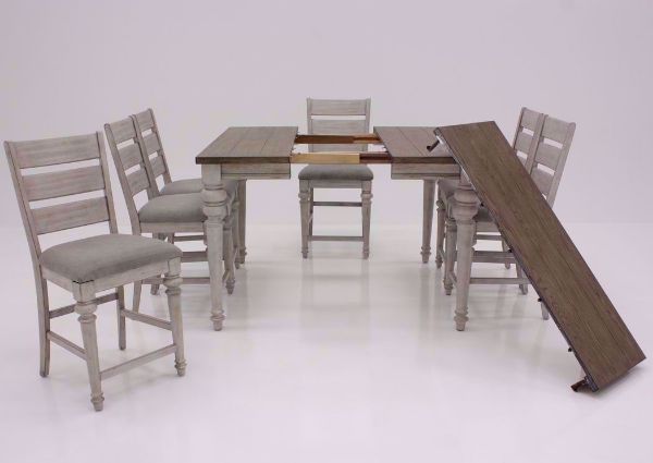 White Two-Tone Heartland 7 Piece Bar Height Table Set Facing Front With the Leaf Out and to the Side | Home Furniture Plus Mattress