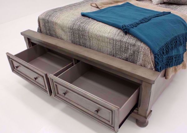 Light Gray Lettner Queen Size Sleigh Bed by Ashley Furniture Showing the Footboard with Drawers Open | Home Furniture Plus Bedding