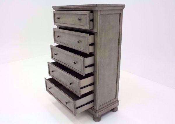 Distressed Light Gray Lettner Chest of Drawers by Ashley Furniture at an Angle With the Drawers Open | Home Furniture Plus Bedding