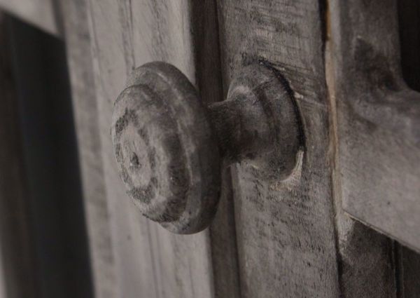 Distressed Gray Cathedral 4 Door Cabinet Showing the Wood Door Knob Detail | Home Furniture Plus Bedding