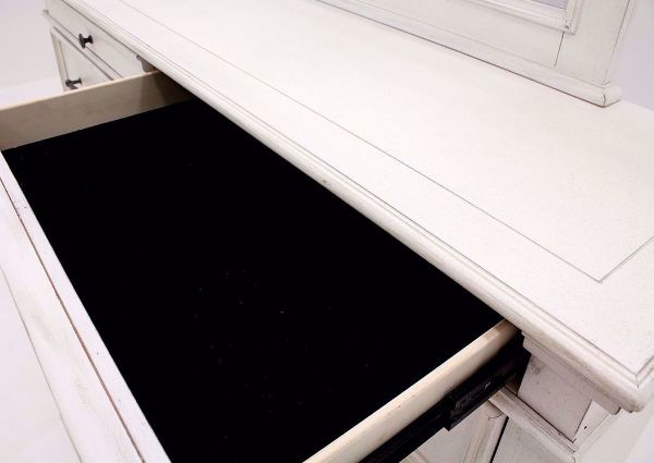 Close Up of the Felt Lined Drawer on the White Kanwyn Dresser by Ashley Furniture | Home Furniture Plus Bedding