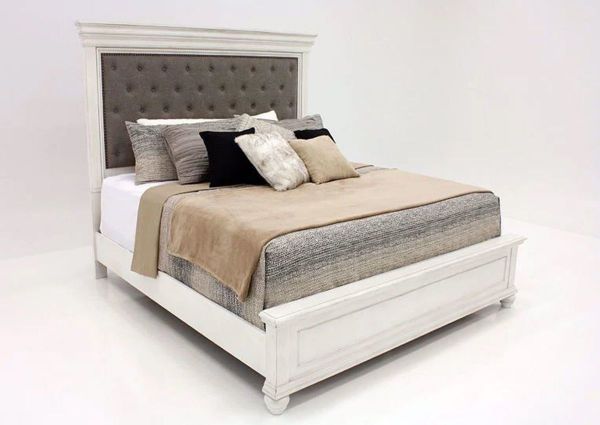 Distressed White Kanwyn Upholstered Queen Size Bed by Ashley Showing the Angle View | Home Furniture Plus Mattress