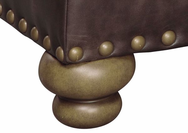 Close Up of Nailhead Accents and Bun Style Feet on Nicorvo Chair by Ashley | Home Furniture Plus Bedding