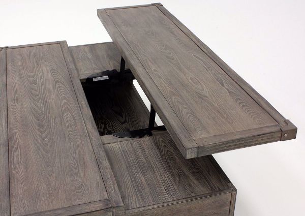 Close Up of the Chaxney Coffee Table by Ashley Showing Table Top Lifted | Home Furniture Plus Bedding