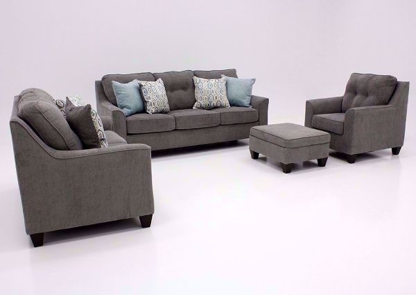 Left Angle of the Surge Sofa Set by Lane Home Furnishings in Smoke Gray Upholstery with Accent Pillows. Includes Sofa, Loveseat and Chair. Ottoman shown is sold separately | Home Furniture Plus Bedding