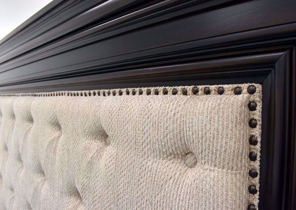 Dark Brown Brynhurst Upholstered Queen Size Bed by Ashley Furniture Showing a Close Up of the Headboard Upholstery | Home Furniture Plus Mattress