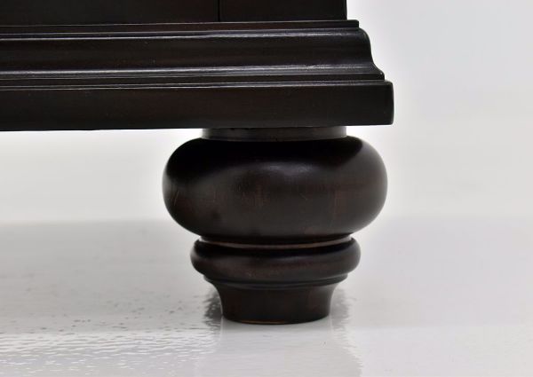 Dark Brown Brynhurst Chest of Drawers by Ashley Furniture Showing the Turned Foot Detail | Home Furniture Plus Mattress
