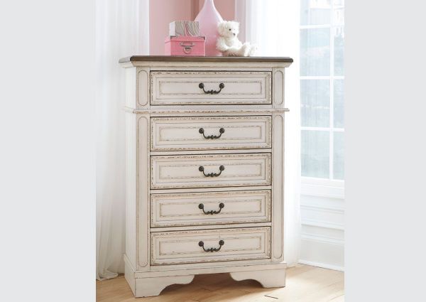 Antique White Realyn Chest of Drawers by Ashley Furniture Showing the Room Setting | Home Furniture Plus Bedding