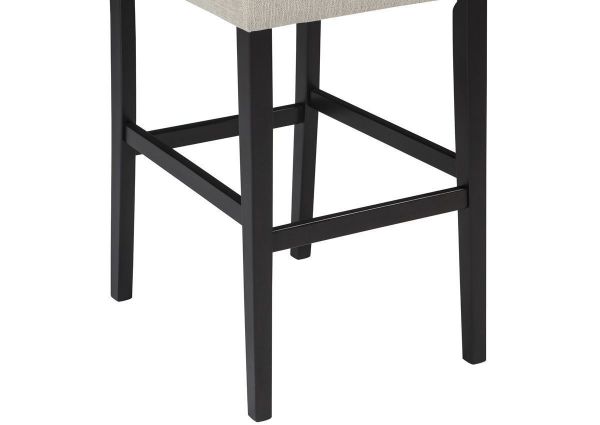Off White Tripton 30 Inch Upholstered Bar Stool by Ashley Showing the Leg Detail | Home Furniture Plus Bedding