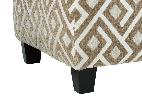 Close Up of the Corner and Feet on the Dovemont Ottoman by Ashley Furniture with Patterned Upholstery in Tan and White | Home Furniture Plus Bedding