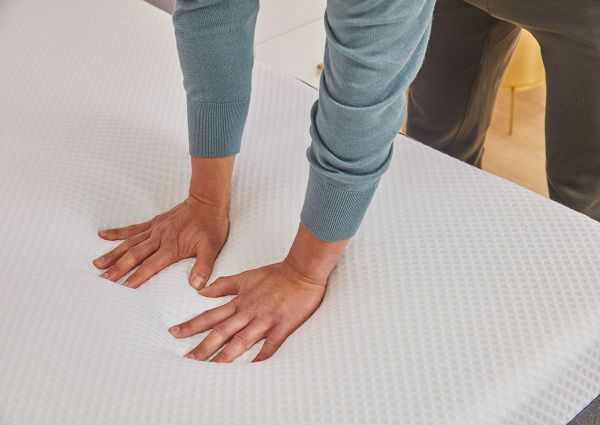 View of Hands Pressing Down on the Nectar Premier King Size Mattress | Home Furniture Plus Bedding