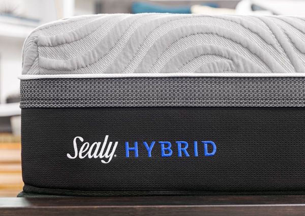 Close Up of the Sealy Hybrid Logo King Size Mattress | Home Furniture Plus Bedding