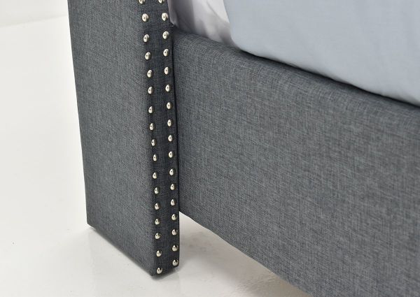 Close Up View of the Nailhead Trim on the Footboard of the Eva King Size Upholstered Bed in Gray by Crown Mark, Intl. | Home Furniture Plus Mattress
