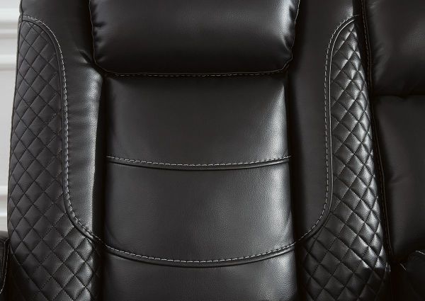 Close Up of the Seat Back on the Party Time POWER Reclining Loveseat in Midnight Black by Ashley Furniture | Home Furniture Plus Bedding