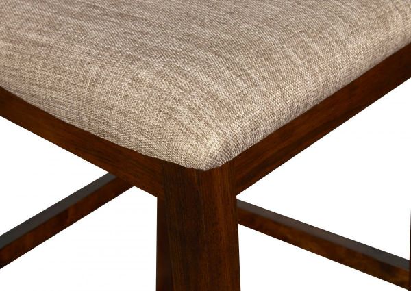 Closeup View of the Gia Counter Height Dining Stool in Cherry by New Classic Furniture | Home Furniture Plus Bedding