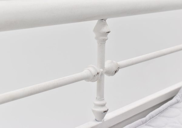 Close Up View of the Spindles on the Vintage Metal Daybed with Trundle in White by Liberty Furniture | Home Furniture Plus Bedding