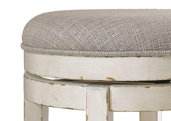 Close Up View of the Seat on the Realyn Swivel Barstool in Off White by Ashley Furniture | Home Furniture Plus Bedding