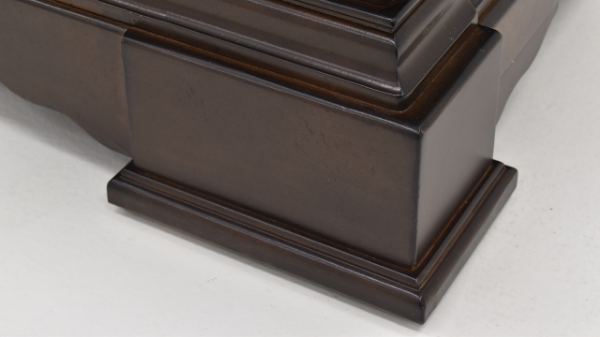 Closeup Foot View of the Brown Plaza Queen Size Bed by Avalon Furniture | Home Furniture Plus Bedding